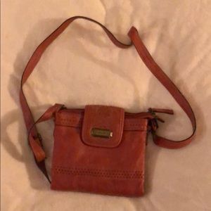 Coral colored crossbody purse